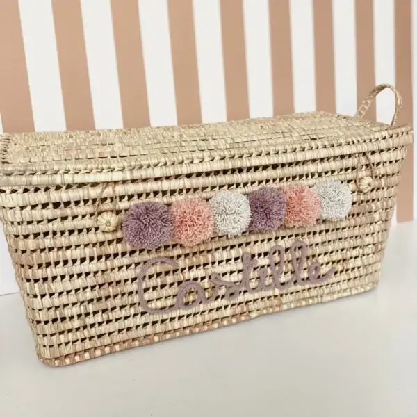 Personalized Moroccan Chest with Pompoms – Handwoven Palm Leaf Storage Trunk in Lilac, Vintage Pink & Beige