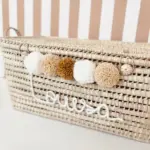 Personalized Moroccan Chest with Tassels – Handwoven Palm Leaf Storage Trunk in Ecru, Camel & Nude