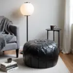 Black Moroccan Leather Pouf – Handcrafted Round Ottoman with Tone-on-Tone Stitching (21″ × 12″)
