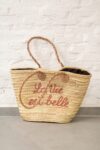 La Vie Est Belle Bag – Handwoven Palm Leaf Basket with Embro