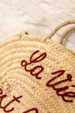 La Vie Est Belle Round Bag – Handmade Palm Leaf Basket