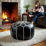 Black Moroccan Leather Pouf – Handcrafted Round Ottoman with White Stitching (21″ × 12″)