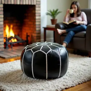 Black Moroccan Leather Pouf – Handcrafted Round Ottoman with White Stitching (21″ × 12″)