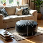 Black Moroccan Leather Pouf – Handcrafted Round Ottoman with White Stitching (21″ × 12″)