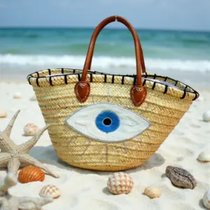 Moroccan Evil Eye Woven Beach Bag – Handcrafted Straw Tote with Leather Handles (11.5″ × 17.7″)