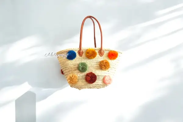Straw Bag with Pom Poms and Leather Handles – Handcrafted Moroccan Raffia Tote