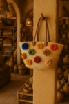 Straw Bag with Pom Poms and Leather Handles – Handcrafted Moroccan Raffia Tote