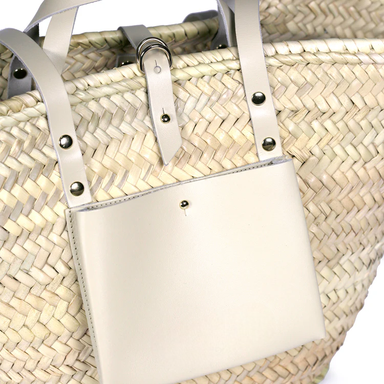 028059a6b0b1ec5d32eedce1134f26accabc8204c078761765060382a3664397-1.png Cream Basket – Handwoven Doum & Off-White Leather Summer Tote