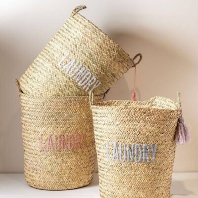 37f2dd4e4079c5cf6bd8ce761123ca5aebbf4fe98849320d2a0ce9a4208eea53-1.jpeg Title: Woven Palm Basket Laundry with Handles 🌸
