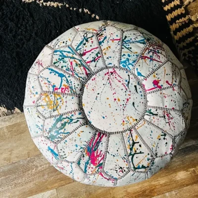 7831028a99188d0681c1c5fee1864243370ae95e29f9b282cfa0a092e56ee9e6.webp Rainbow Moroccan Round Leather Pouf 🌈✨
