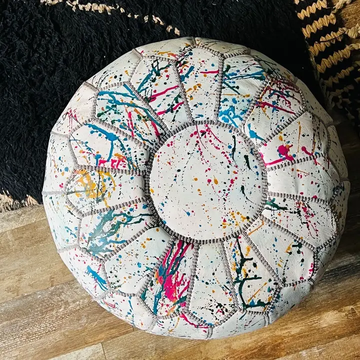 7831028a99188d0681c1c5fee1864243370ae95e29f9b282cfa0a092e56ee9e6.webp Rainbow Moroccan Round Leather Pouf 🌈✨