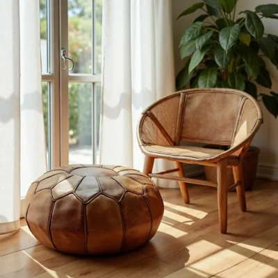 Handmade-Moroccan-Round-Ottoman-Pouf-in-Light-Brown-Genuine-Leather-4.webp Handcrafted Moroccan Round Leather Pouf – Light Brown (21″ × 16″)