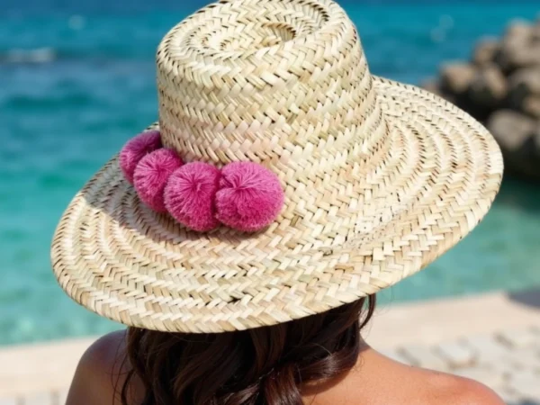 Moroccan-Straw-Beach-Hat-With-Pompom-1.webp Handwoven Moroccan Pompom Straw Beach Hat – 26″ Wide Brim Boho Sun Hat