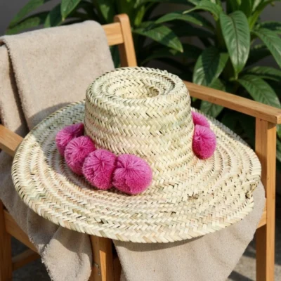 Moroccan-Straw-Beach-Hat-With-Pompom-4.webp Handwoven Moroccan Pompom Straw Beach Hat – 26″ Wide Brim Boho Sun Hat