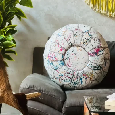 a88361c88a39fdd3557d4f2c1a6df26f9cba9b7d047ede9782d3c24a0edad7ea.webp Rainbow Moroccan Round Leather Pouf 🌈✨
