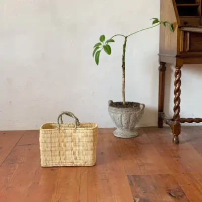 a8e42b57a670227d1ce790585c9a041541f5f3cc5ae1624d316fc54485f0870a.webp Medina Tassel Basket - Handwoven Rattan Bag | Moroccan Boho Tote