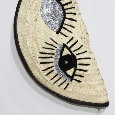 Eyes Clutch – Handwoven Palm Leaf Bag with Embroidered Eyes Design