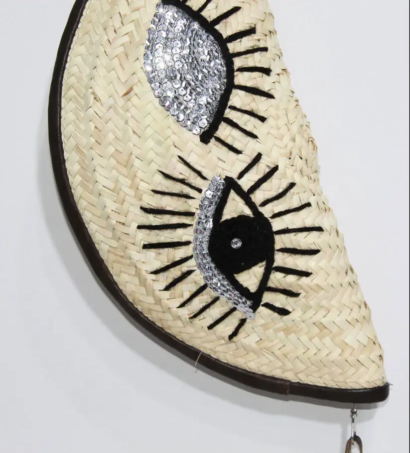 Eyes Clutch – Handwoven Palm Leaf Bag with Embroidered Eyes Design