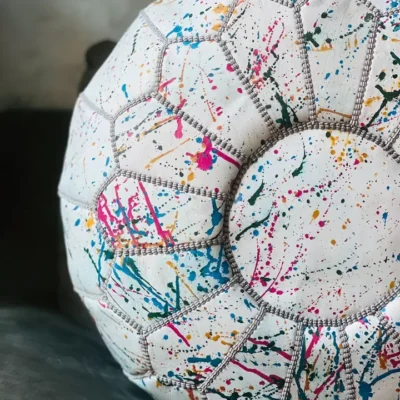 ce9ee422bea1712aaffcd9effae5d5a56e6a564a45d7b36786024a2123515710.webp Rainbow Moroccan Round Leather Pouf 🌈✨