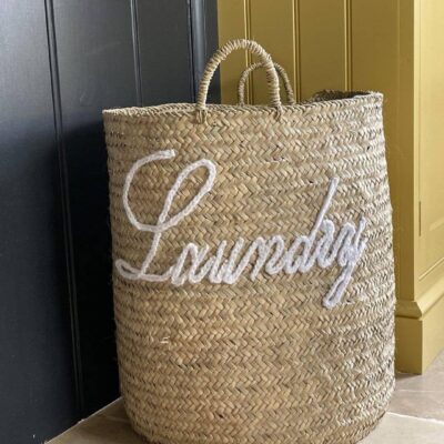 e0073e9788fa23f445e1b68b5a0b63054a0dd96b70a0ffc2f1780fa923b68768-1.jpeg Title: Woven Palm Basket Laundry with Handles 🌸
