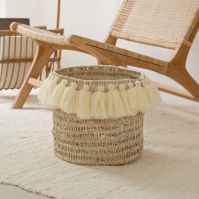 ebea78d7005a60ebb771867aa7b0a6faa418d44ea0531eedda795c56c630e28e-2.jpeg Handwoven Round Basket with Tassel Pompoms – Moroccan Storage & Decor