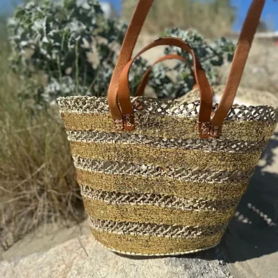 ffe286d92a2f131753c4a8bd1ed6bcbe1dbd2d0a7406e3d46935c46519cfdf4f-1.webp Sequin Basket – Handwoven Doum Palm Fiber Tote with Leather Handles & Drawstring Closure