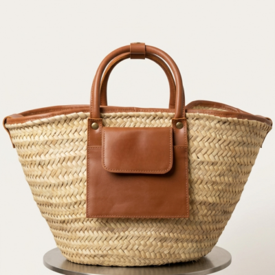 Moroccan Straw Basket Bag Leather Handles Convertible Tote Crossbody Handbag Palm Leaf Market Bag Pocket Boho Beach Bag Gift for Her (1) Close-up of Moroccan straw basket bag showing genuine leather front flap pocket, short top handles and long convertible crossbody strap