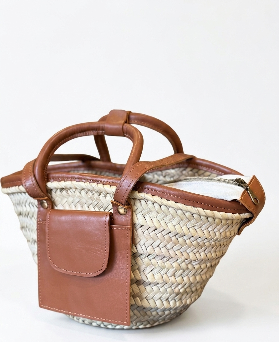 Moroccan Straw Basket Bag Leather Handles Convertible Tote Crossbody Handbag Palm Leaf Market Bag Pocket Boho Beach Bag Gift for Her (10) Close-up of Moroccan straw basket bag showing genuine leather front flap pocket, short top handles and long convertible crossbody strap