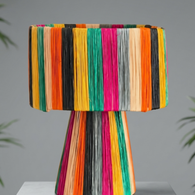 Handmade Moroccan multicolor raffia mushroom table lamp with bold rainbow stripes in teal, yellow, orange, fuchsia, black and grey, wide drum shade on tapered cone base