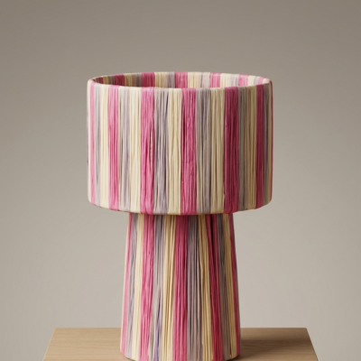 Handmade Moroccan raffia mushroom table lamp with pink grey and natural striped weave on solid square wood base, boho artisan desk light on terrazzo surface