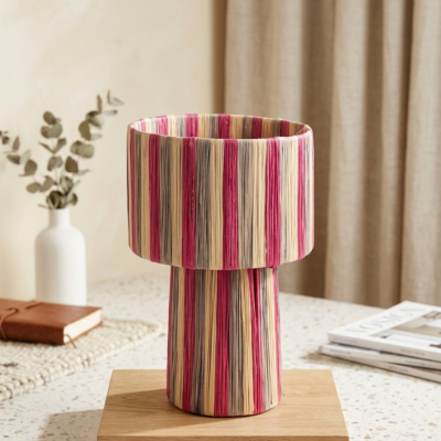 Handmade Moroccan raffia mushroom table lamp with pink grey and natural striped weave on solid square wood base, boho artisan desk light on terrazzo surface