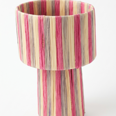 Handmade Moroccan raffia mushroom table lamp with pink grey and natural striped weave on solid square wood base, boho artisan desk light on terrazzo surface