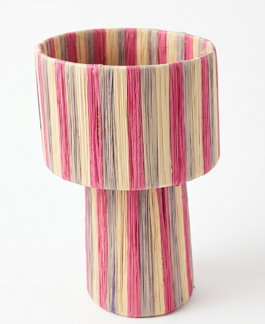 Handmade Moroccan raffia mushroom table lamp with pink grey and natural striped weave on solid square wood base, boho artisan desk light on terrazzo surface