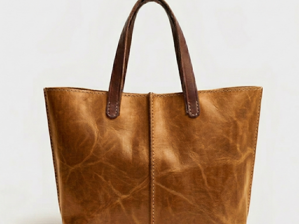 Handmade Moroccan pull-up distressed tobacco leather tote bag with two-tone tan body and dark espresso handles, center seam detail, open top, everyday work bag for women