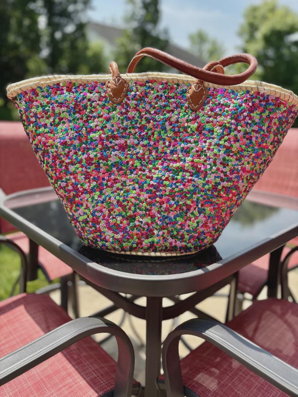 il_1140xN.7576514192_p4ih Large handwoven Moroccan straw beach tote bag with all-over multicolor sequin pompom confetti weave, natural braided palm rim, decorative leather anchor tabs and tan leather top handles